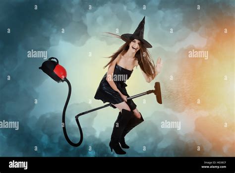 Witch on a magic vacuum cleaner